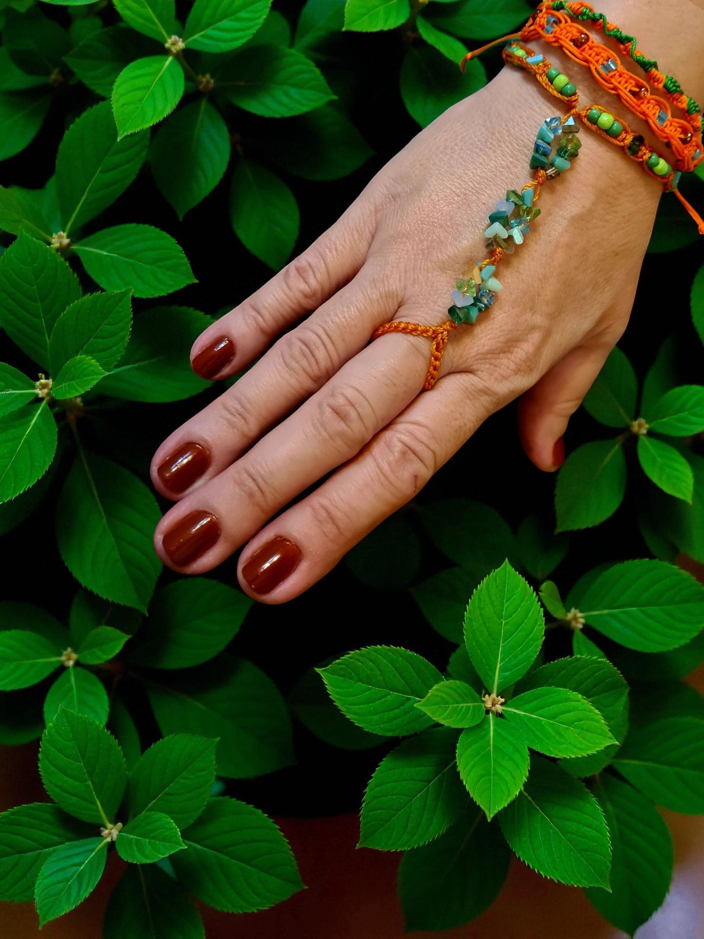 🌙 Boho & Mystical
“Let your spirit sparkle — this handmade beaded hand chain connects you to your inner goddess.”